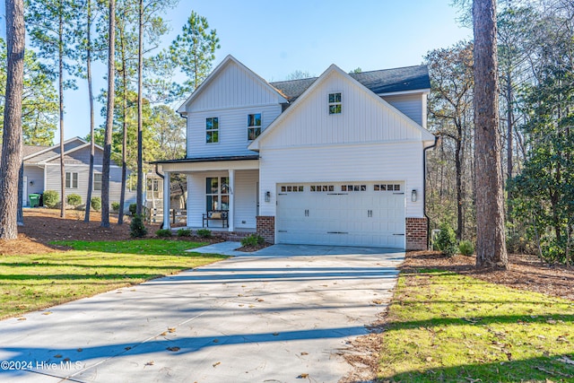 view of front of home with a porch and a front yard