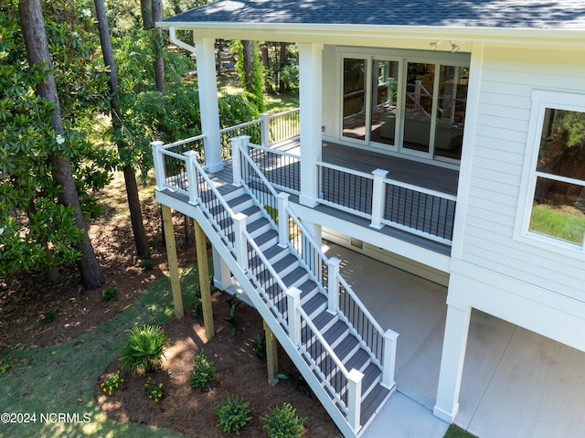 view of side of home featuring a deck