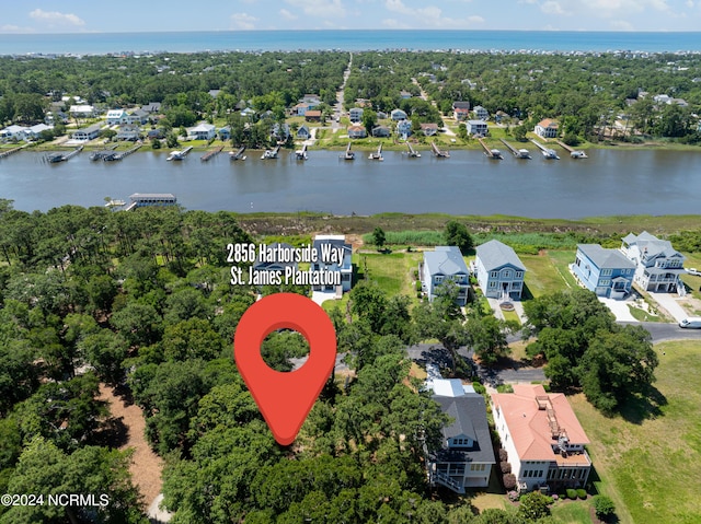 bird's eye view with a water view