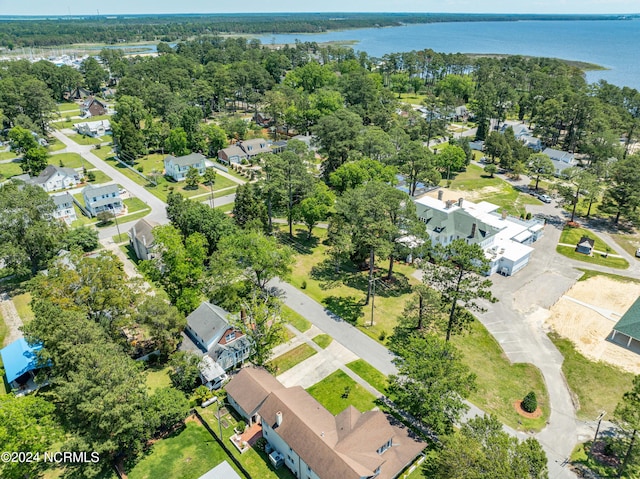 birds eye view of property with a water view and a residential view