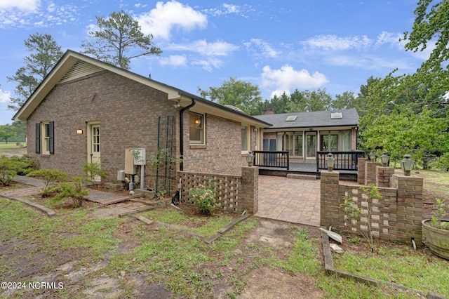 back of house featuring a patio