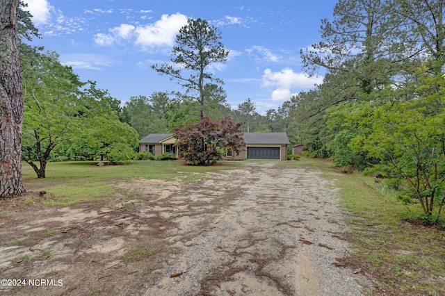 view of yard with a garage