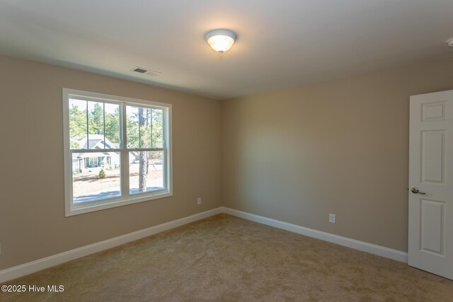 bonus room featuring light colored carpet and lofted ceiling