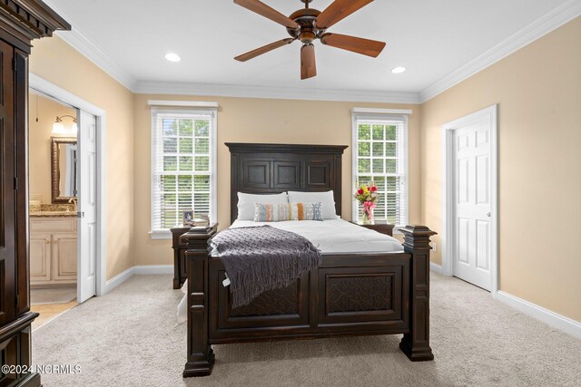 bedroom featuring light carpet, multiple windows, and ornamental molding