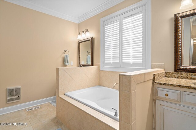 full bath with vanity, ornamental molding, a garden tub, and visible vents