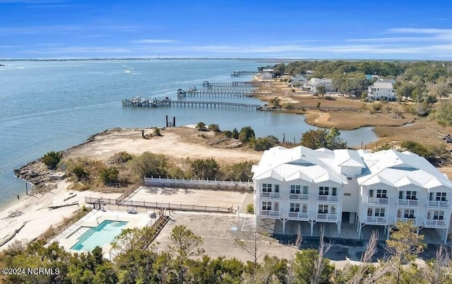 birds eye view of property featuring a water view