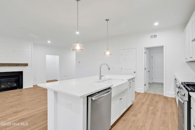 1320 Trisail Ter, Wilmington, NC 28412 - kitchen featuring light countertops, stainless steel appliances, visible vents, and a sink