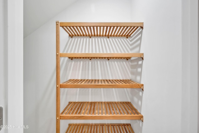 1320 Trisail Ter, Wilmington, NC 28412 - stairs with a sauna and vaulted ceiling