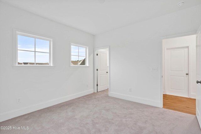 1320 Trisail Ter, Wilmington, NC 28412 - carpeted empty room with baseboards
