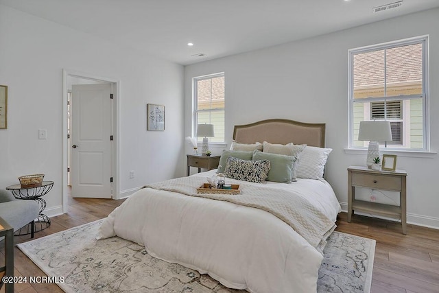 bedroom featuring light hardwood / wood-style floors