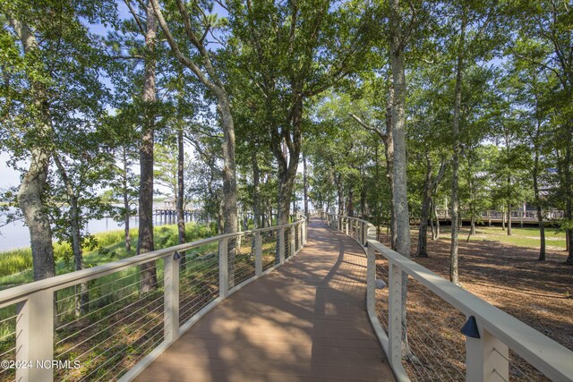 1320 Trisail Ter, Wilmington, NC 28412 - exterior space featuring a fire pit and a residential view