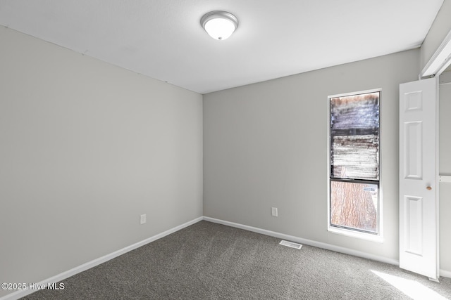 empty room featuring carpet