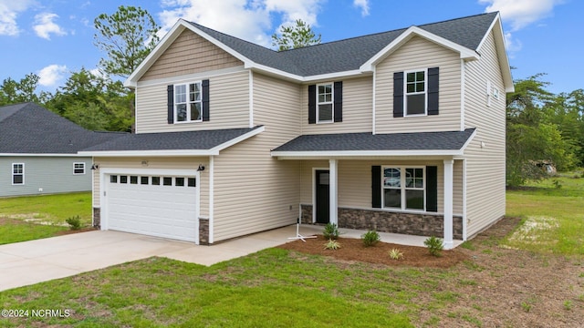 view of front facade featuring a front lawn and covered porch