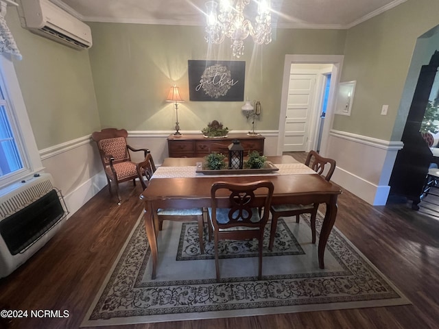 dining room with dark wood-style floors, a wall unit AC, heating unit, ornamental molding, and a chandelier