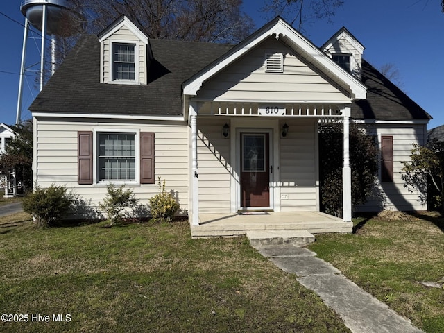 view of front of property with a front lawn