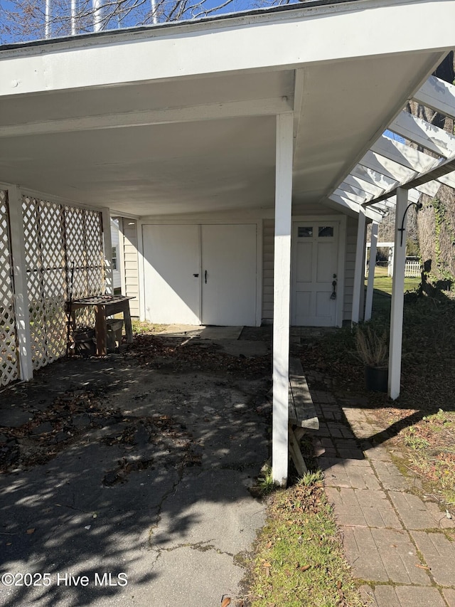 view of patio / terrace featuring a carport