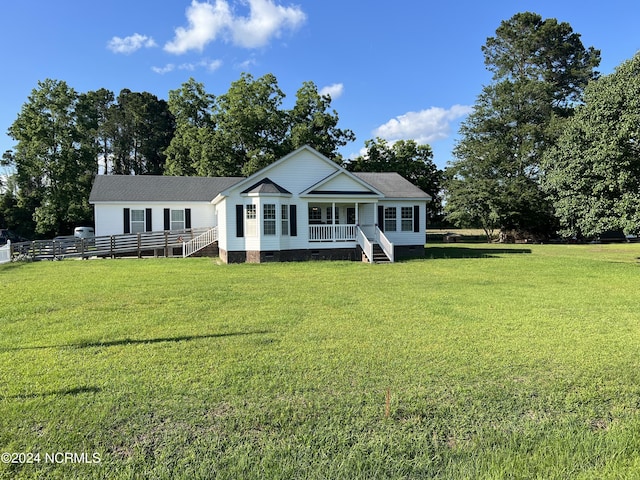 view of front of property featuring a front lawn and a porch