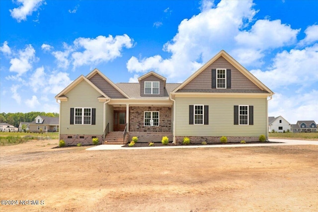 craftsman-style home featuring covered porch