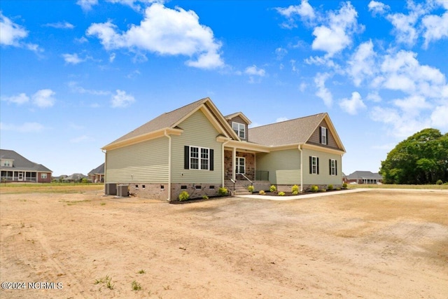 view of front of property with central air condition unit