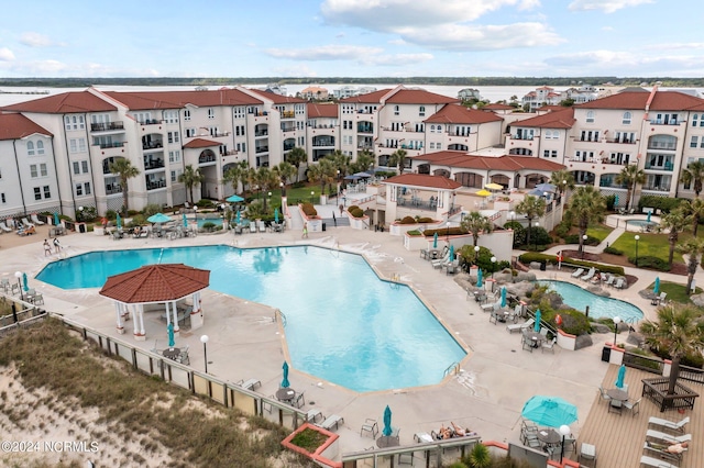 view of pool featuring a patio