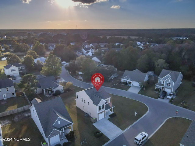 birds eye view of property with a residential view