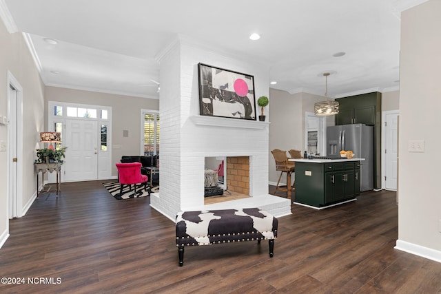 living room with crown molding and dark hardwood / wood-style flooring