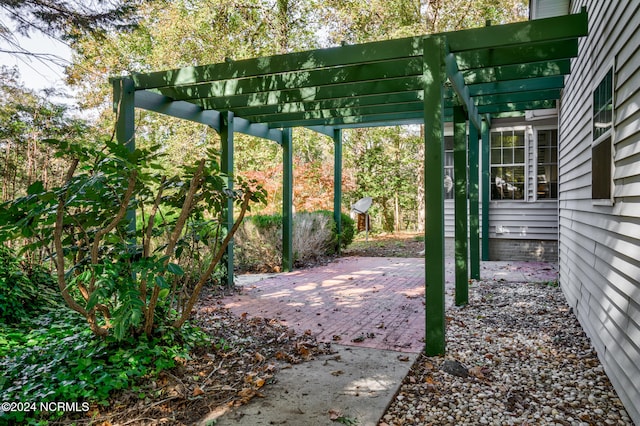 view of patio featuring a pergola