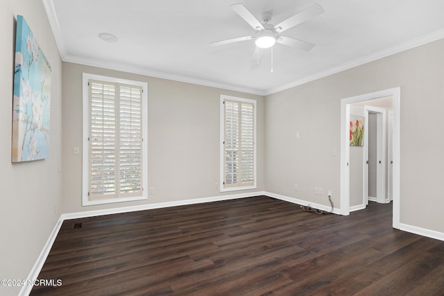 empty room with ceiling fan, ornamental molding, and dark hardwood / wood-style flooring