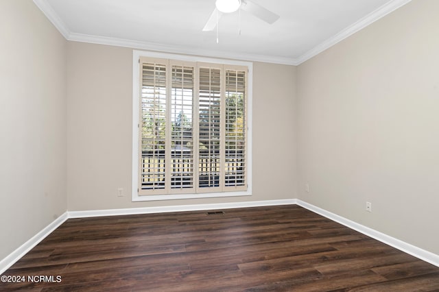 empty room with ornamental molding, dark hardwood / wood-style floors, and ceiling fan