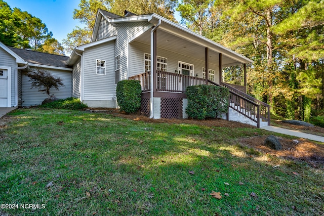 view of home's exterior with a lawn