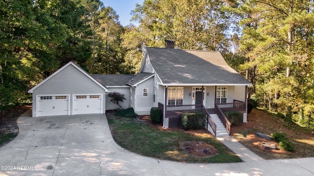 view of front facade featuring a porch and a garage