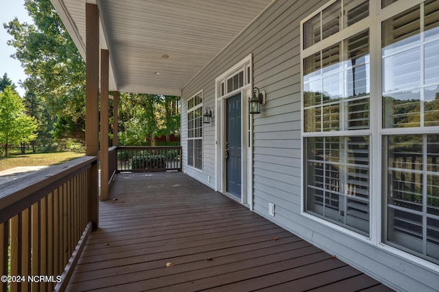 deck with covered porch