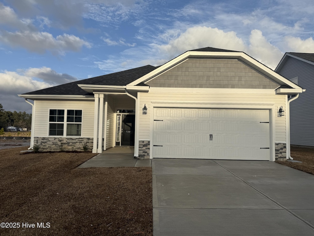 view of front of home featuring a garage