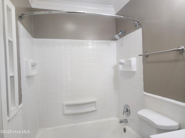 full bathroom with shower / bathing tub combination, toilet, and crown molding