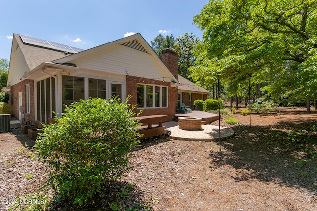 view of property exterior featuring a patio