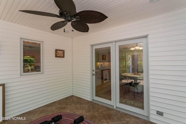 view of patio with ceiling fan and french doors