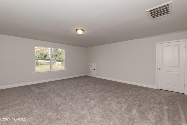 empty room with carpet flooring