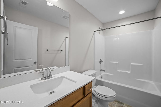 full bathroom featuring toilet, shower / tub combination, vanity, and recessed lighting