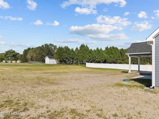 view of yard featuring fence