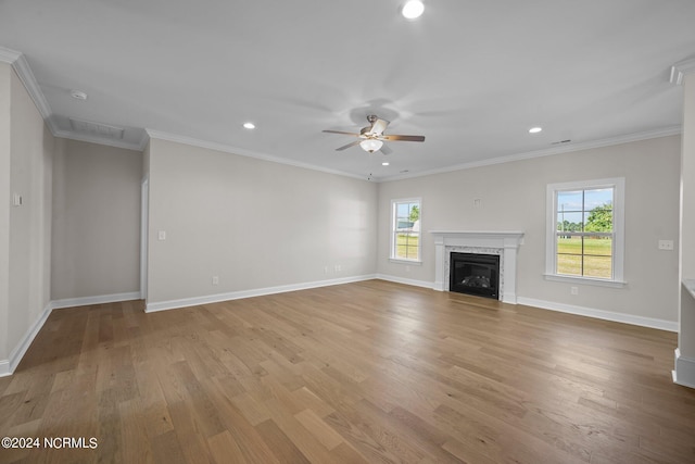 unfurnished living room with a ceiling fan, light wood-type flooring, a fireplace, baseboards, and recessed lighting