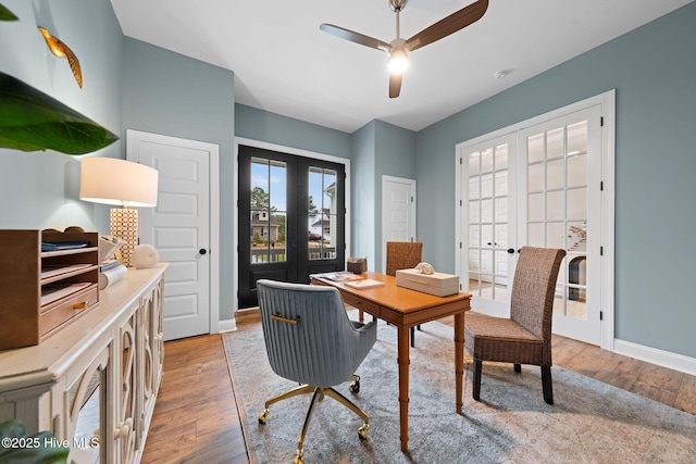 dining area featuring light hardwood / wood-style flooring, ceiling fan, and french doors