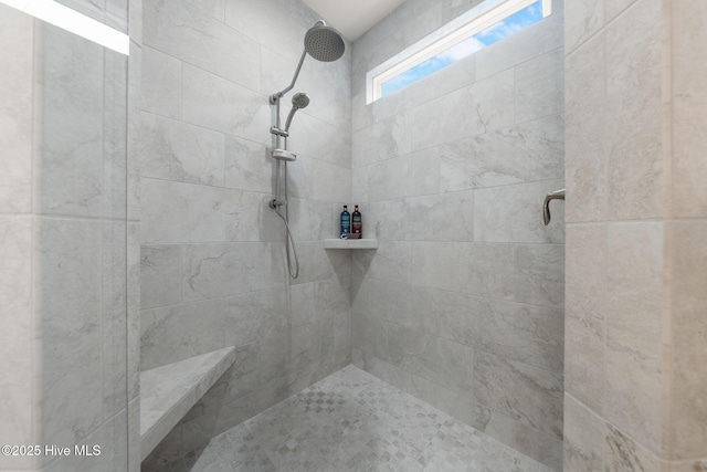 bathroom featuring tiled shower