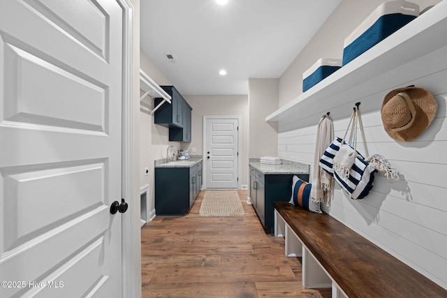 mudroom featuring sink and dark hardwood / wood-style flooring