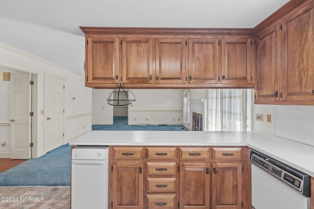 kitchen with white dishwasher and ornamental molding