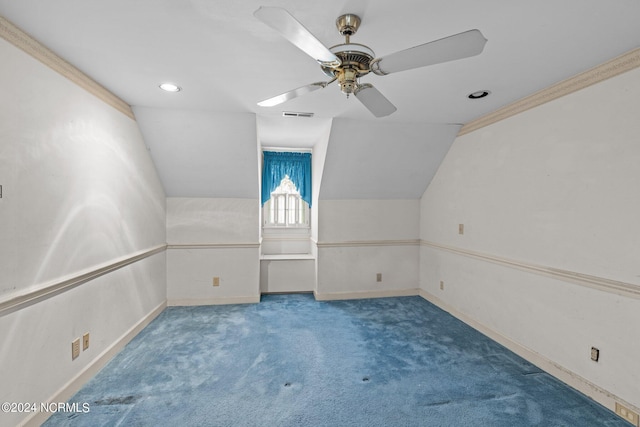 additional living space with carpet flooring, ceiling fan, and lofted ceiling