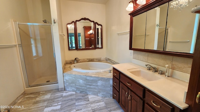 bathroom with tile floors, plus walk in shower, and vanity