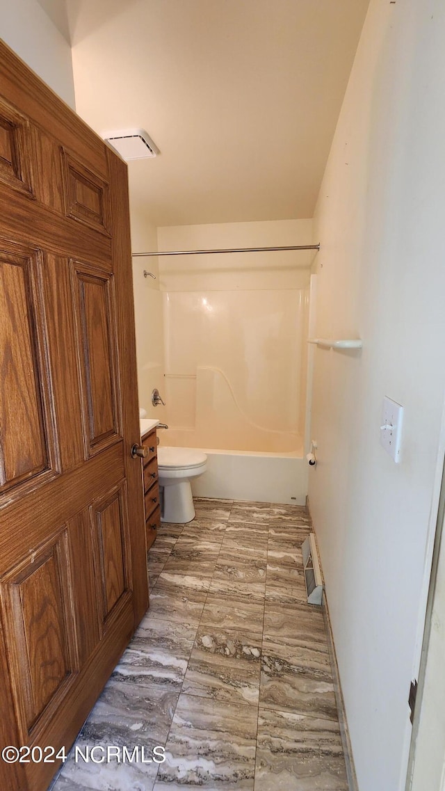 full bathroom with shower / bathtub combination, tile floors, vanity, and toilet