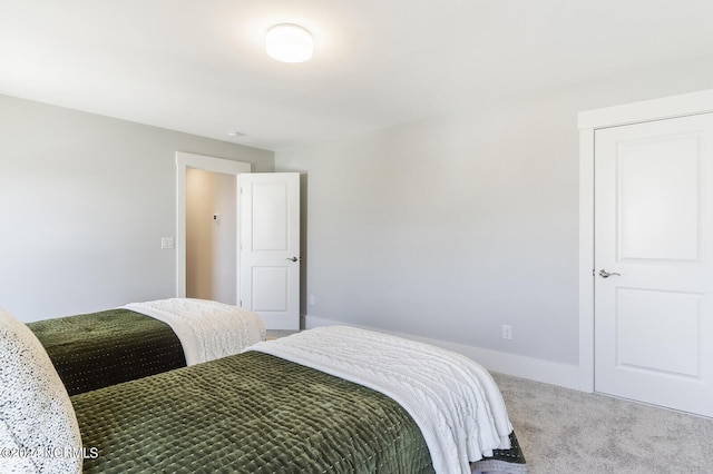 bedroom featuring carpet flooring