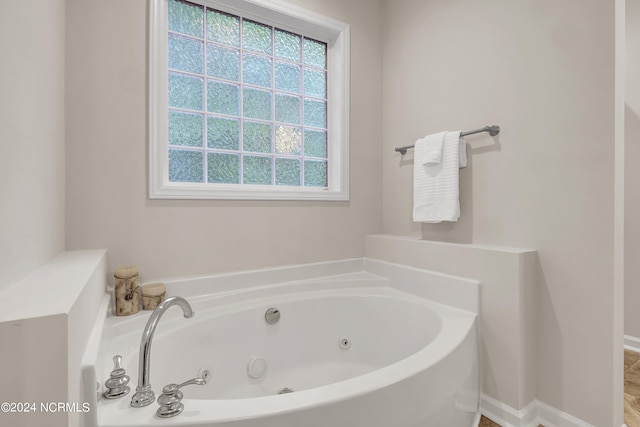 bathroom with a tub