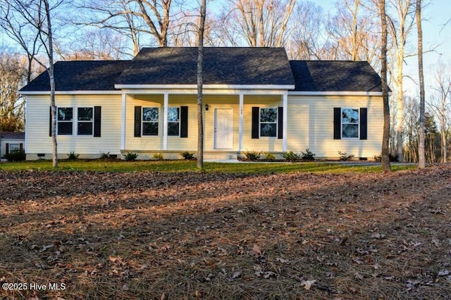 ranch-style house with covered porch